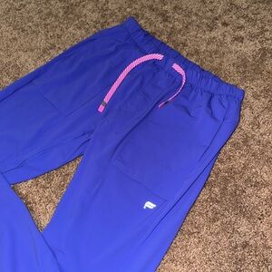 Fabletics purplish blue joggers. Brand new, never worn. Size medium.
